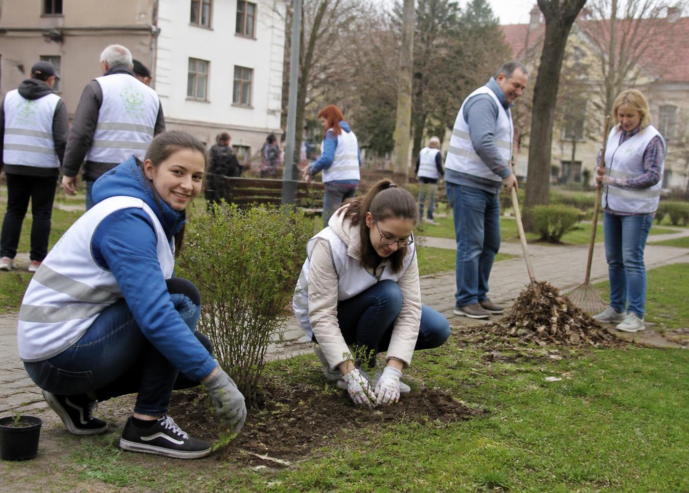 Smile volunteers planting and cleaning a public park in Kladno
